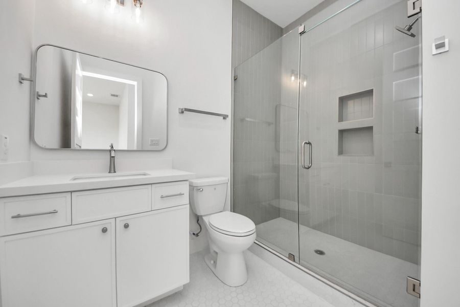 Pictures of model home, corner unit. Listing is of  the 2nd home in the row. Some finishes may vary.