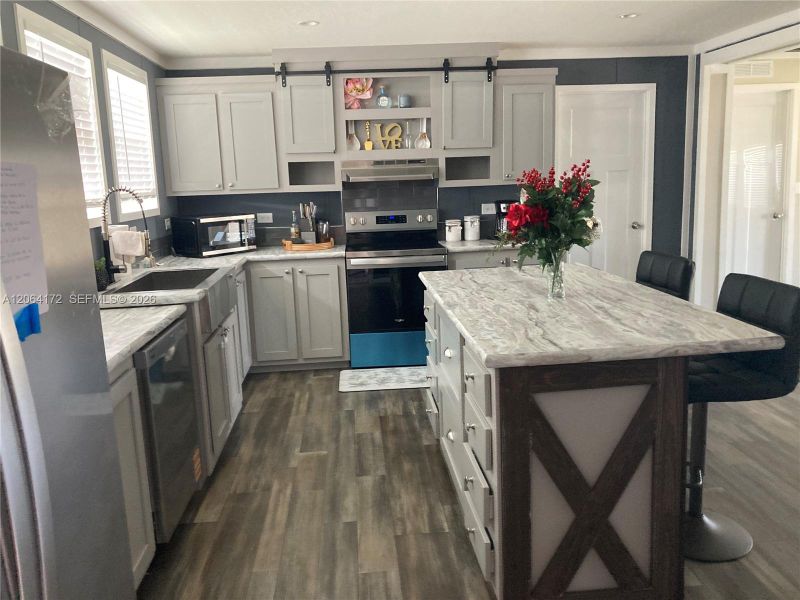 Furnished interior view inside a new home in , Clewiston (Image 3).