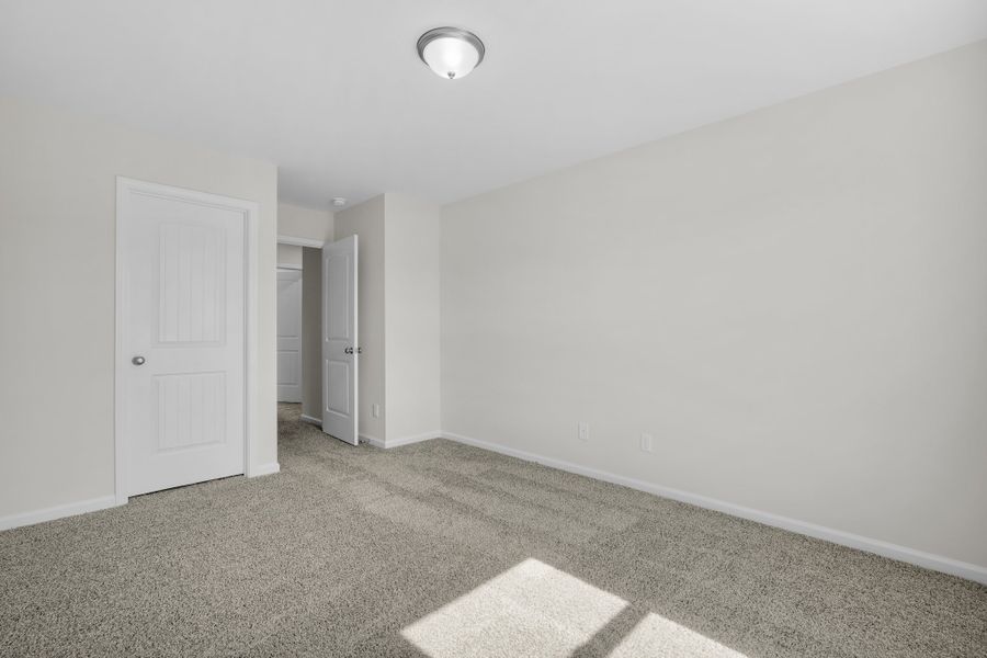 Representative unfurnished interior of a home built from the The Magnolia by Smith Family Homes in Lakeview Pines, Statesboro (Image 60).