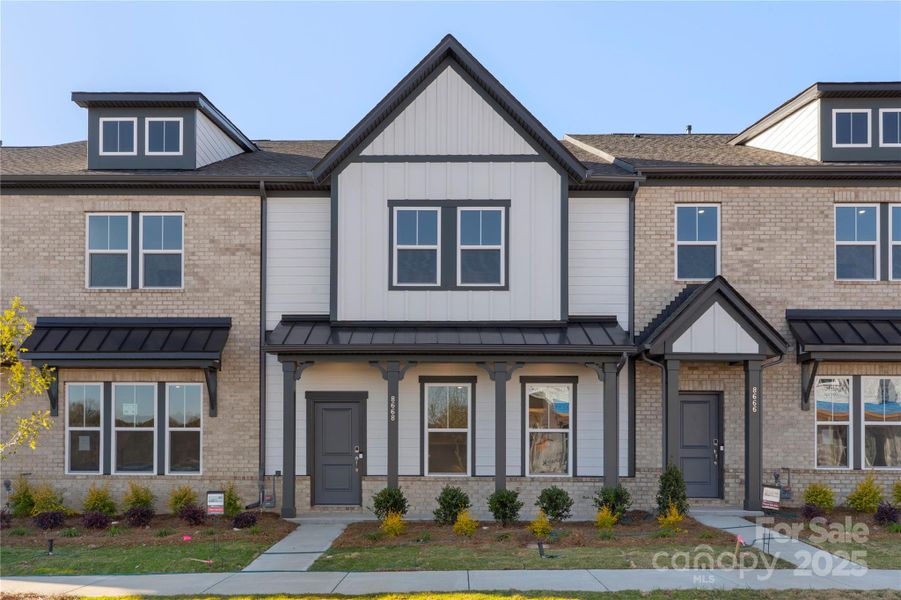 Front exterior of a new home in , Indian Land, SC, highlighting curb appeal (Image 1).
