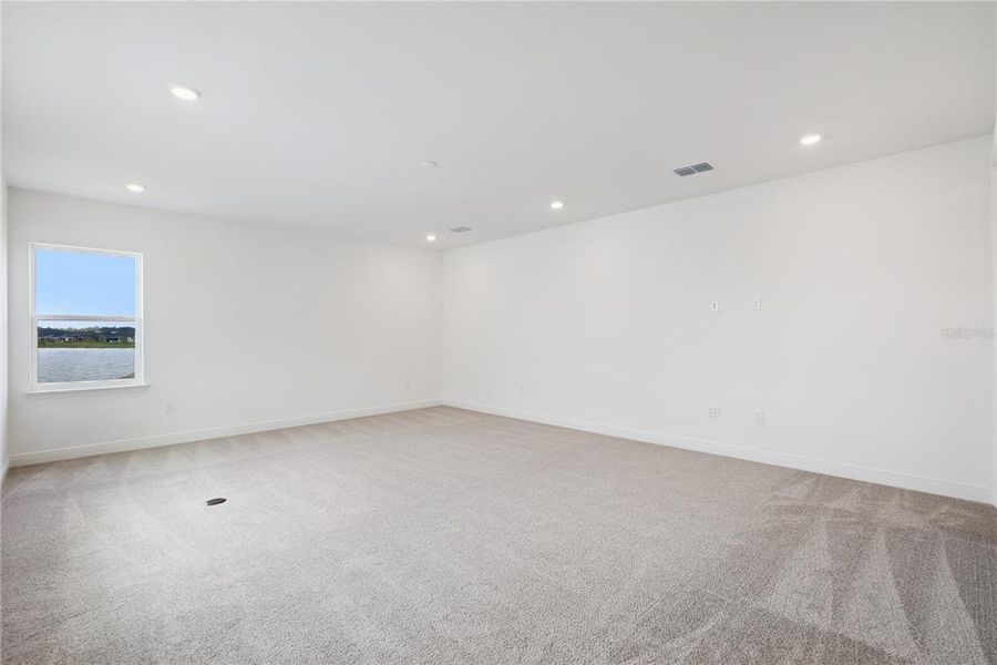 Spacious, unfurnished interior of a new home in Laureate Park, Orlando (Image 40).