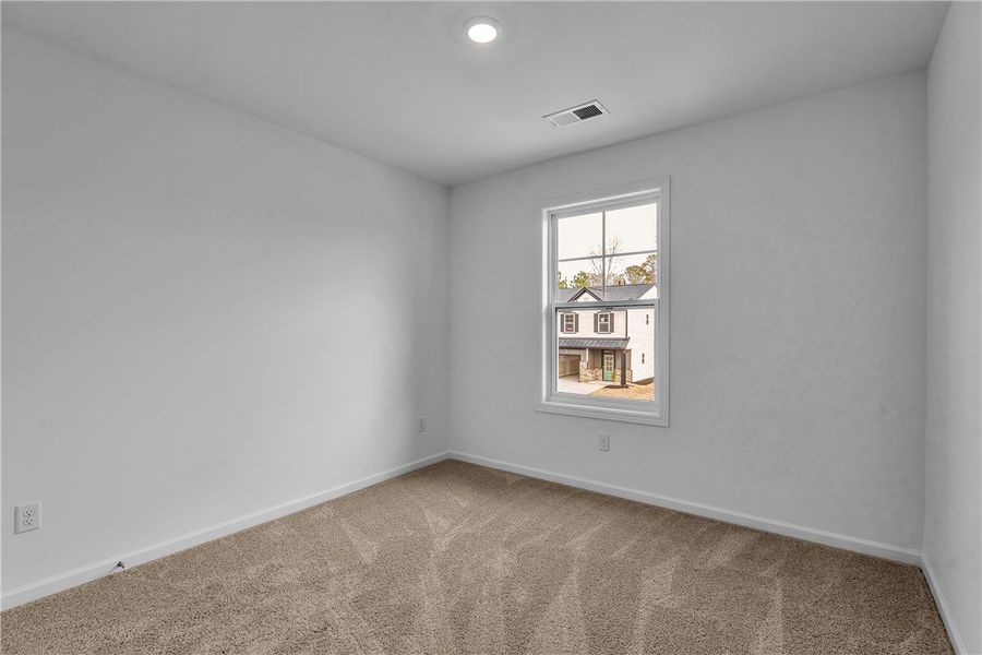 This bright and airy room offers a comfortable and This bright and airy room offers a comfortable and