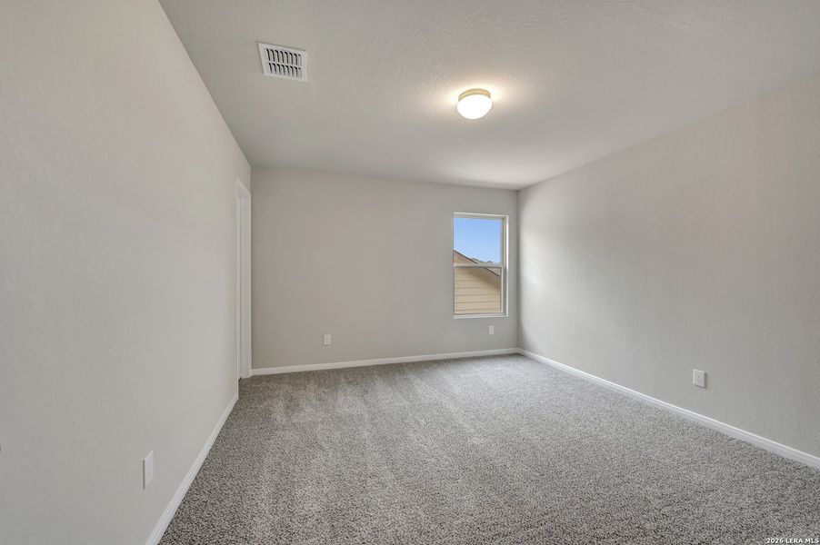 Spacious, unfurnished interior of a new home in Hunters Ranch, San Antonio (Image 44).