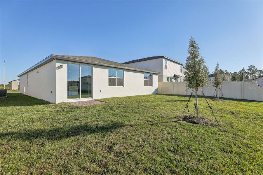 Exterior details and patio area of a home in Lake Deer Estates - Signature Series, Poinciana (Image 22).