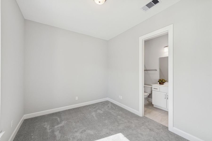 Ensuite bath at front bedroom Ensuite bath at front bedroom