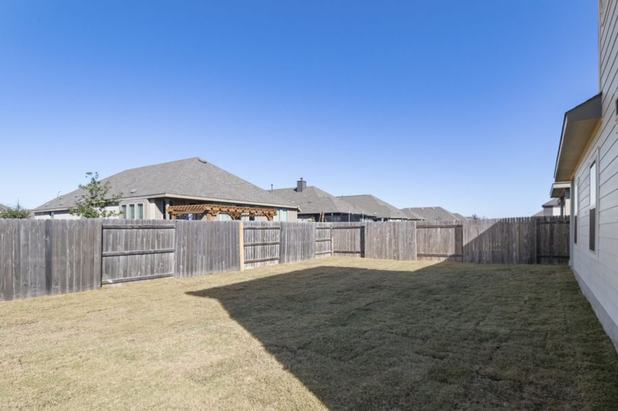 Exterior details and patio area of a home in Crosswinds, Kyle (Image 29).