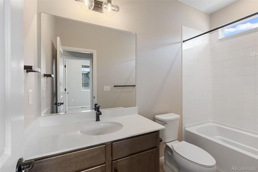 Furnished interior view inside a new home in The Cottages Collection at Ridgeline Vista, Brighton (Image 7).