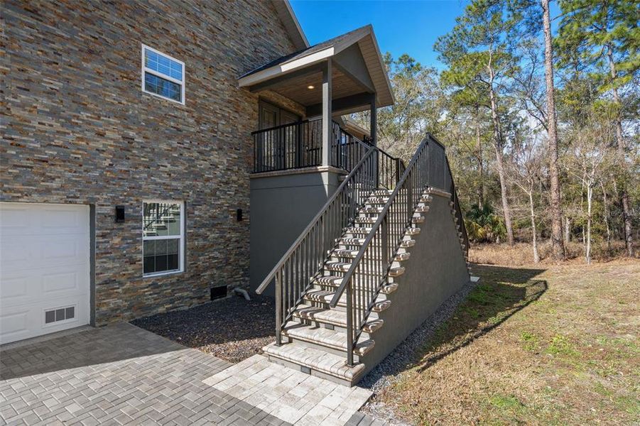 Exterior details and patio area of a home in , Webster (Image 31).