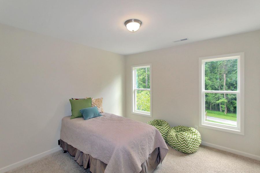 Representative furnished interior of a home built from the Furyk by RiverWILD Homes in Riverwood Ranch, Clayton (Image 15).