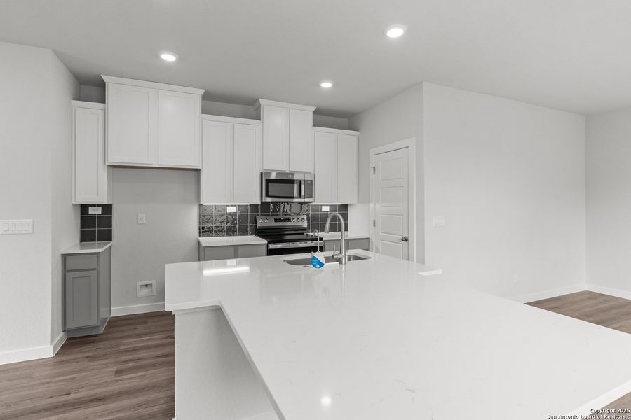 Furnished interior view inside a new home in Highland Ridge, New Braunfels (Image 6). Furnished interior view inside a new home in Highland Ridge, New Braunfels (Image 6).