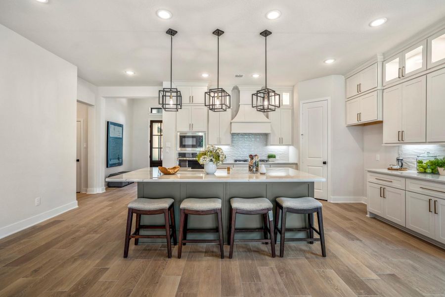 Furnished interior view inside a new home in ARTAVIA, Conroe (Image 10).