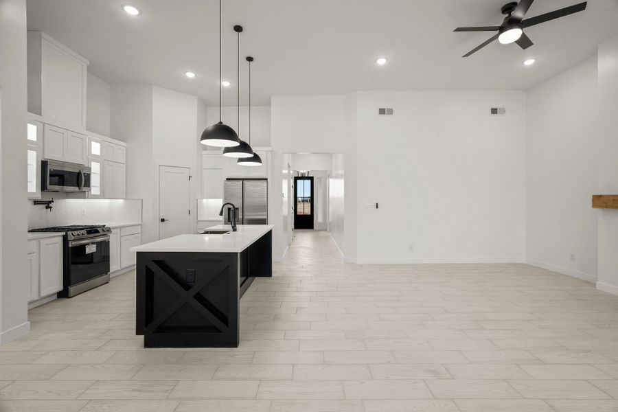 Representative furnished interior of a home built from the Torrey Pines by LEH. Homes in Verdancia, El Paso (Image 19).