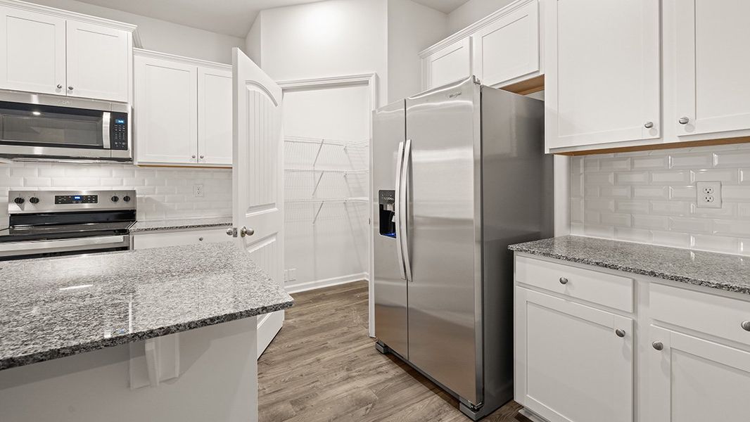Furnished interior view inside a new home in Greyton Springs Place, Buford (Image 7).