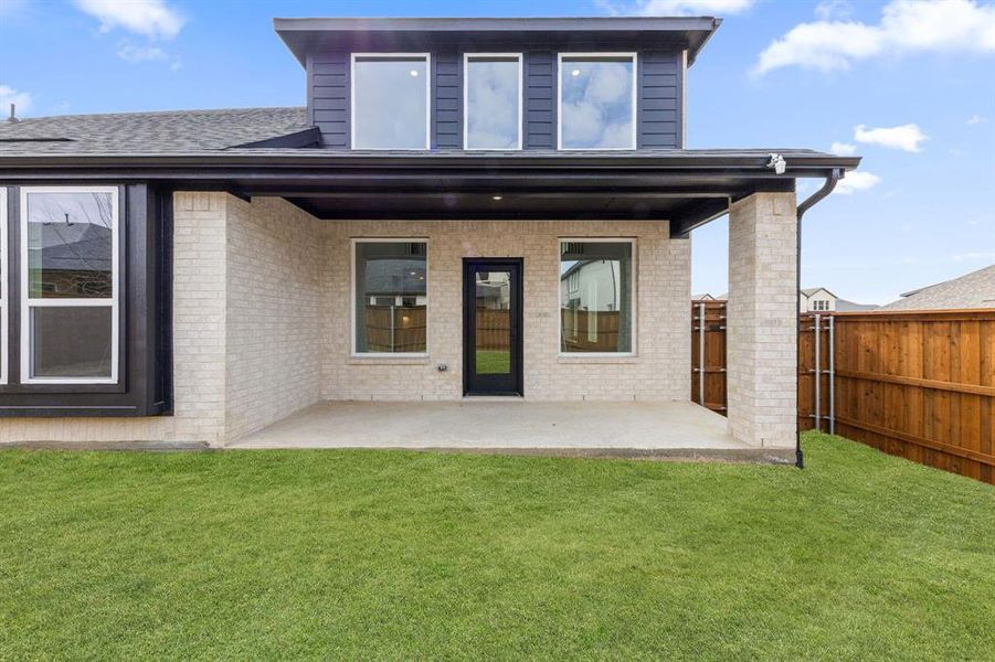 Dining al fresco is in your future on this lovely covered back patio! Dining al fresco is in your future on this lovely covered back patio!
