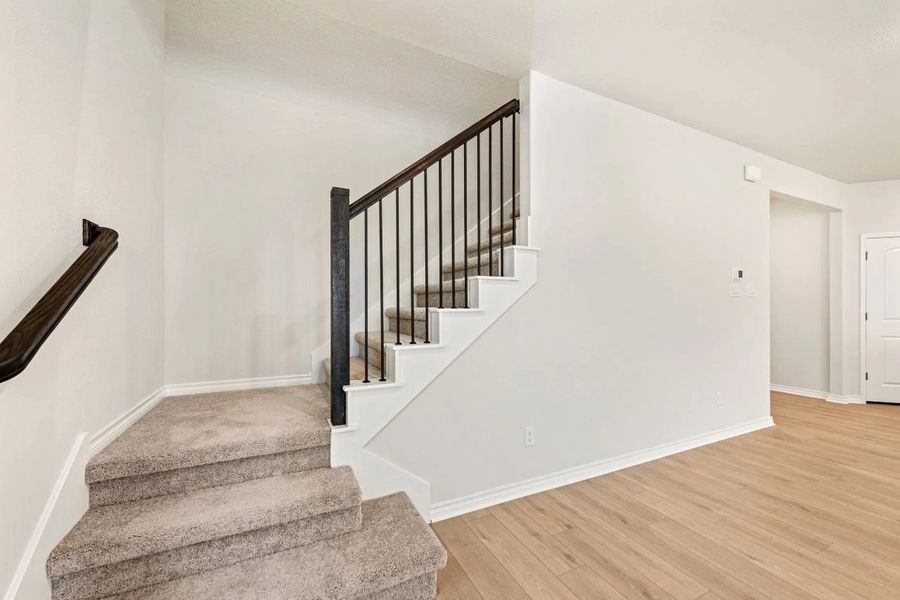 Spacious, unfurnished interior of a new home in The Cottages at Lariat, Liberty Hill (Image 39).