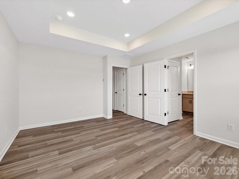 Spacious, unfurnished interior of a new home in North Creek Village, Huntersville (Image 24).