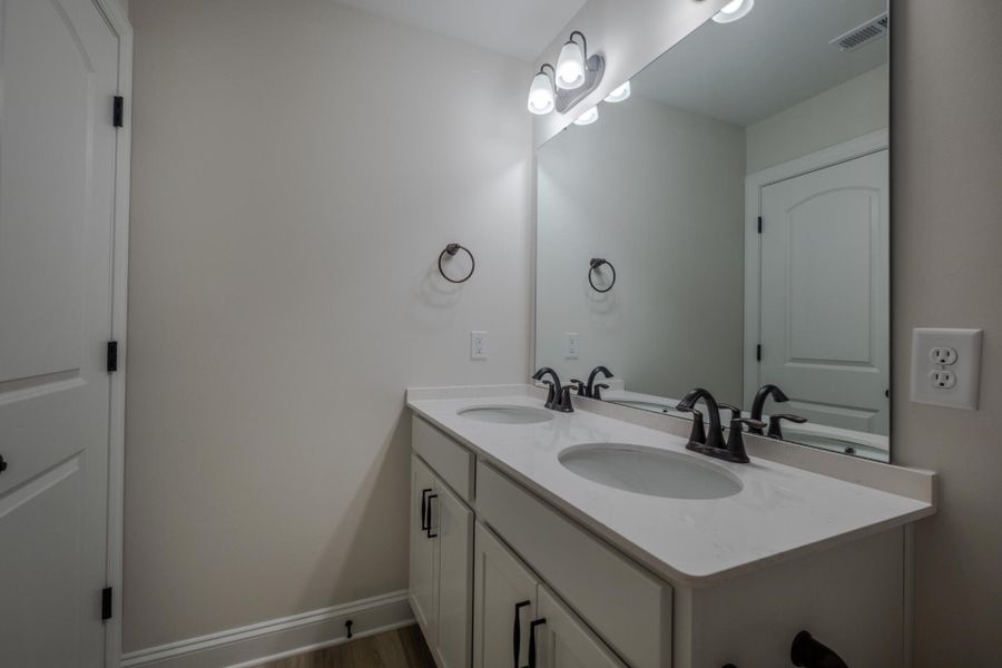 Furnished interior view inside a new home in Cottages at Piper Village, Trinity (Image 15). Furnished interior view inside a new home in Cottages at Piper Village, Trinity (Image 15).