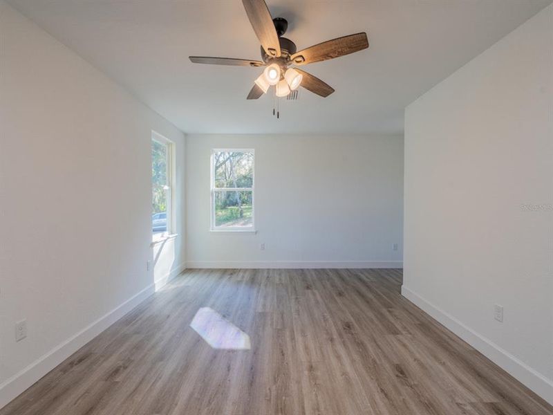 Spacious, unfurnished interior of a new home in , Fort McCoy (Image 11).