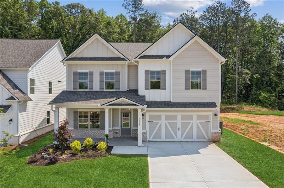 Front exterior of a new home in , Flowery Branch, GA, highlighting curb appeal (Image 25).