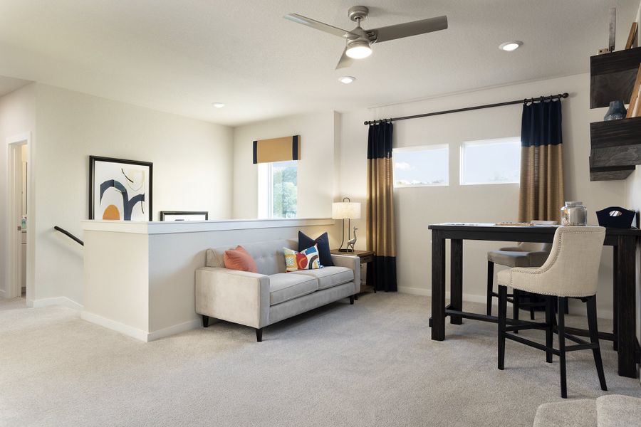 Representative furnished interior of a home built from the Quinley by Scott Felder Homes in Prominence, San Antonio (Image 24).