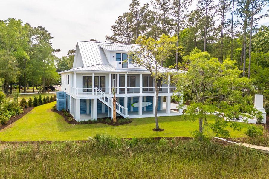 Exterior details and patio area of a home in , Johns Island (Image 46).