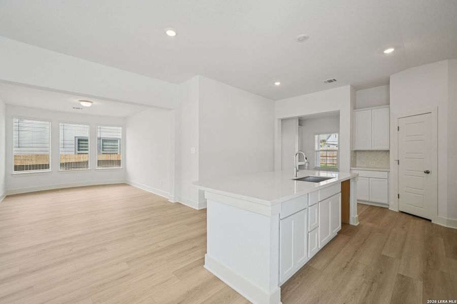 Furnished interior view inside a new home in Estancia Ranch - Premier Series, San Antonio (Image 9).