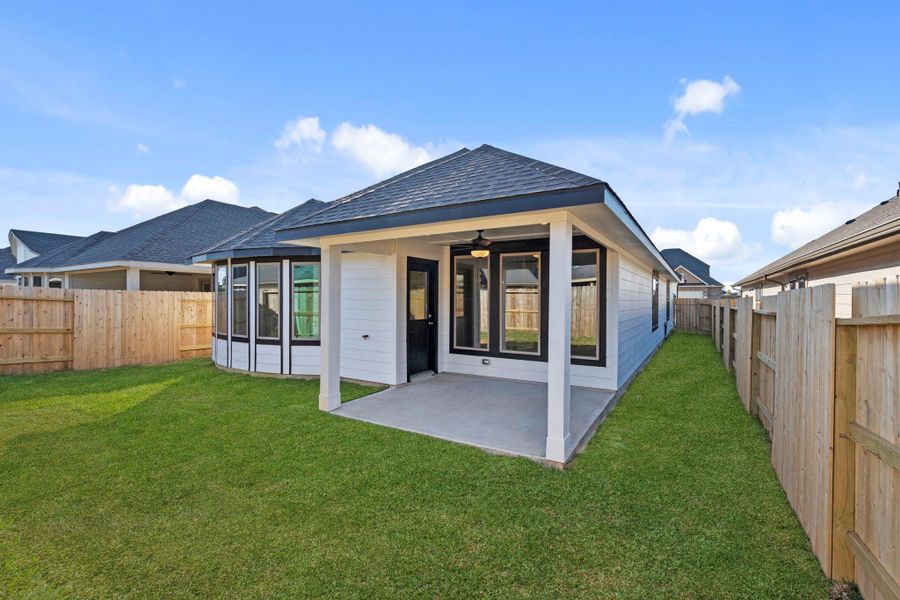 Exterior details and patio area of a home in The Meadows at Imperial Oaks, Conroe (Image 4).