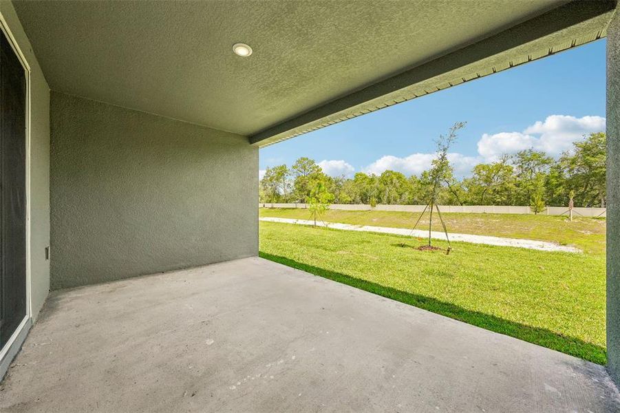 Exterior details and patio area of a home in Pine Ridge Meadows, Hudson (Image 28).
