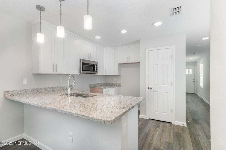 Furnished interior view inside a new home in , Jacksonville (Image 8).