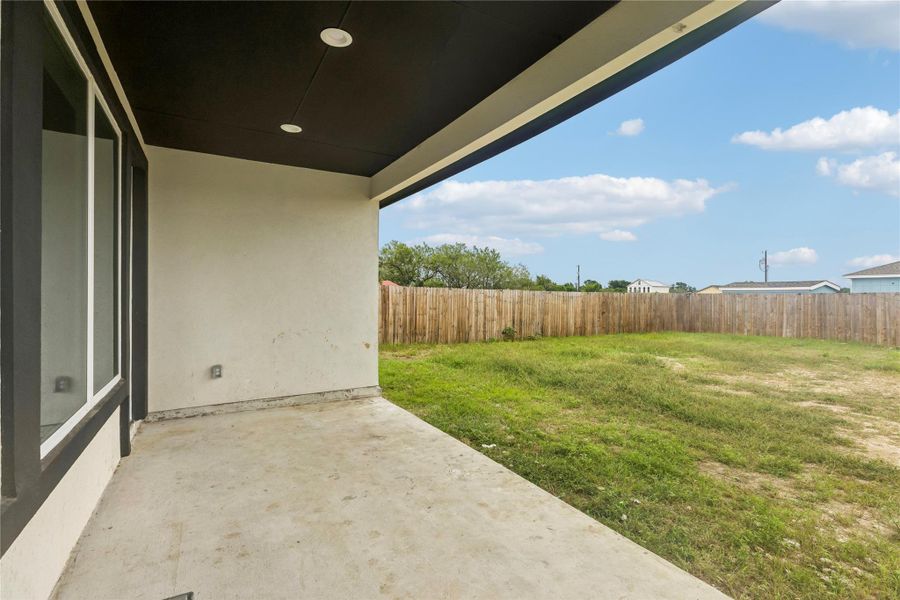A spacious backyard awaits, offering ample room for outdoor activities and relaxation.