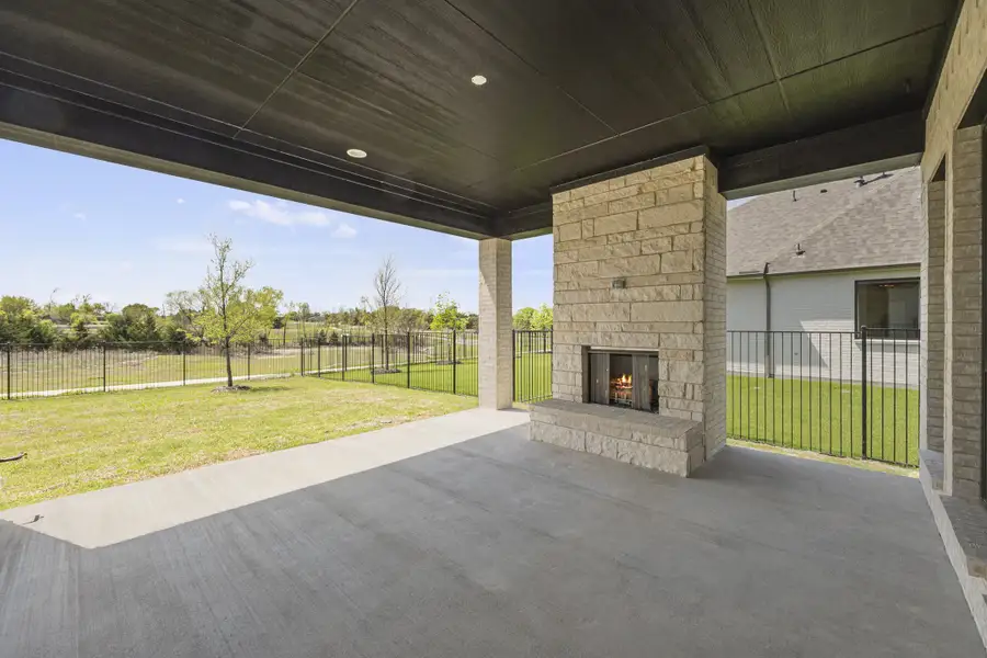 Exterior details and patio area of a home in Winding Creek, Rockwall (Image 4).