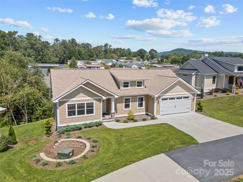 Front exterior of a new home in , Hendersonville, NC, highlighting curb appeal (Image 17). Front exterior of a new home in , Hendersonville, NC, highlighting curb appeal (Image 17).
