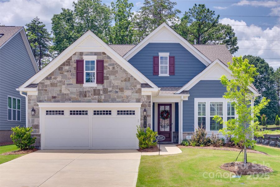 Front exterior of a new home in Handsmill on Lake Wylie, York, SC, highlighting curb appeal (Image 26).