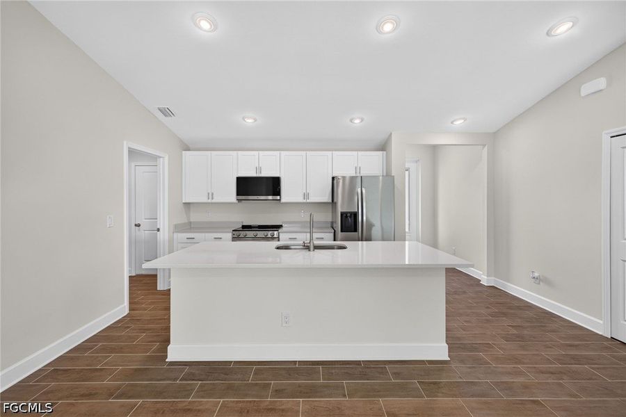 Furnished interior view inside a new home in Cape Coral, Cape Coral (Image 7). Furnished interior view inside a new home in Cape Coral, Cape Coral (Image 7).