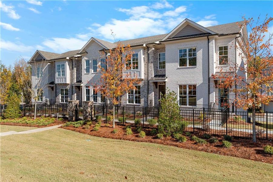 Front exterior of a new home in , Johns Creek, GA, highlighting curb appeal (Image 25).