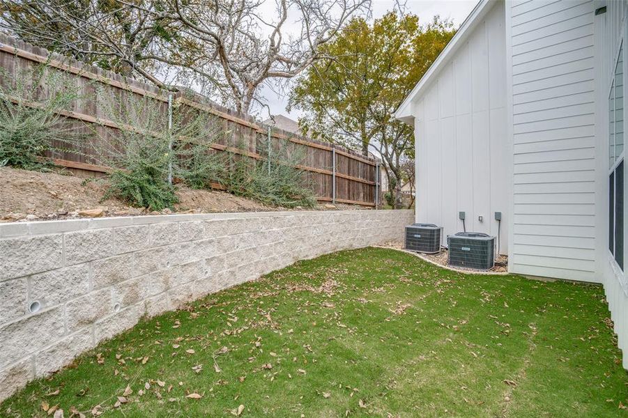 View of yard featuring cooling unit