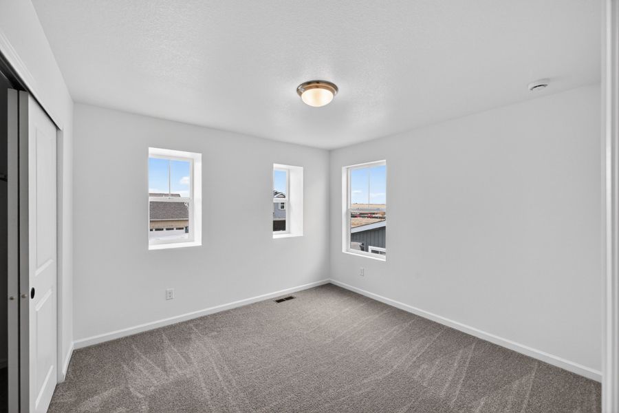 Spacious, unfurnished interior of a new home in The Town Collection at Independence, Elizabeth (Image 13).