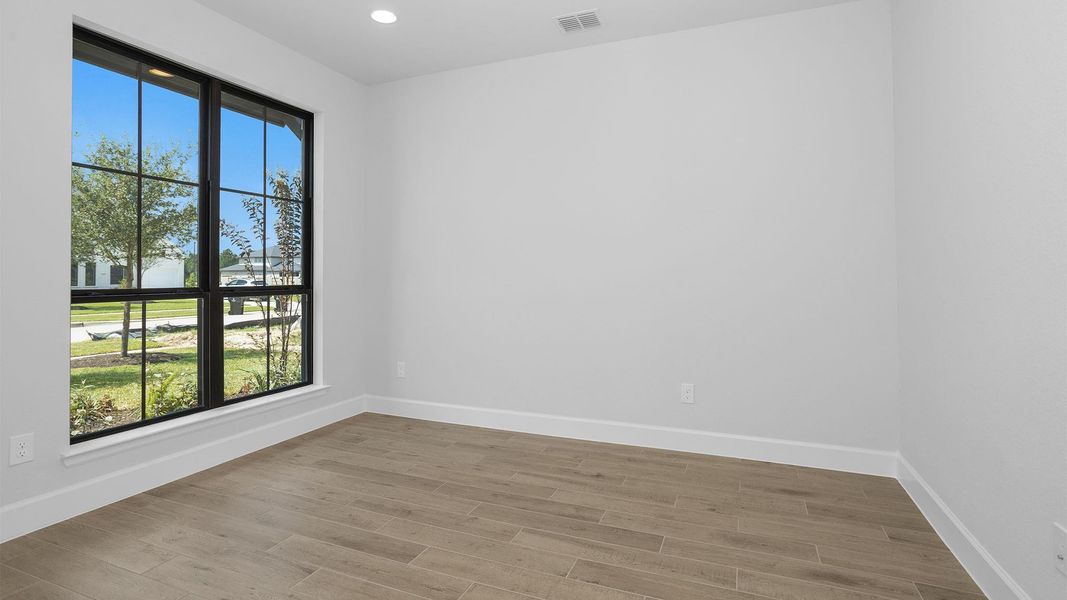 Spacious, unfurnished interior of a new home in Legacy Prairie at Katy Court, Katy (Image 9).