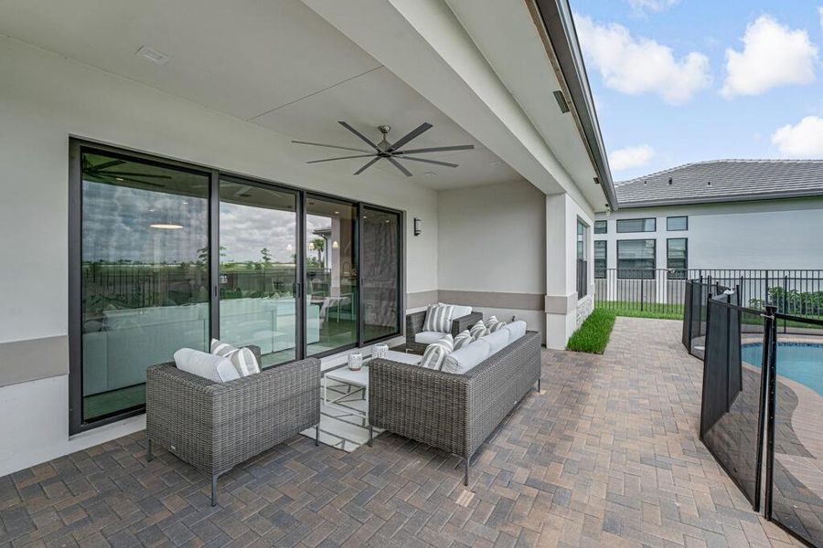 Exterior details and patio area of a home in Apex at Avenir, Palm Beach Gardens (Image 28).