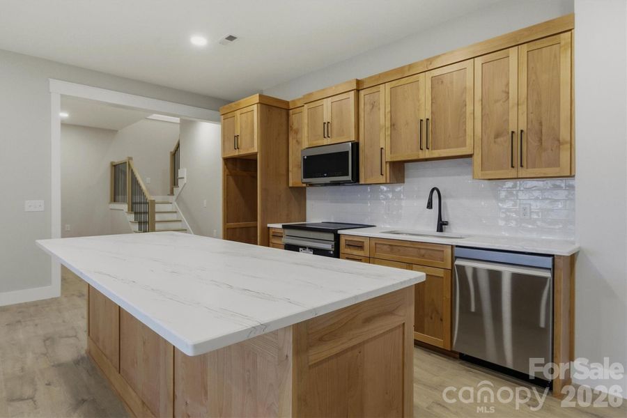 Furnished interior view inside a new home in , Valdese (Image 4).