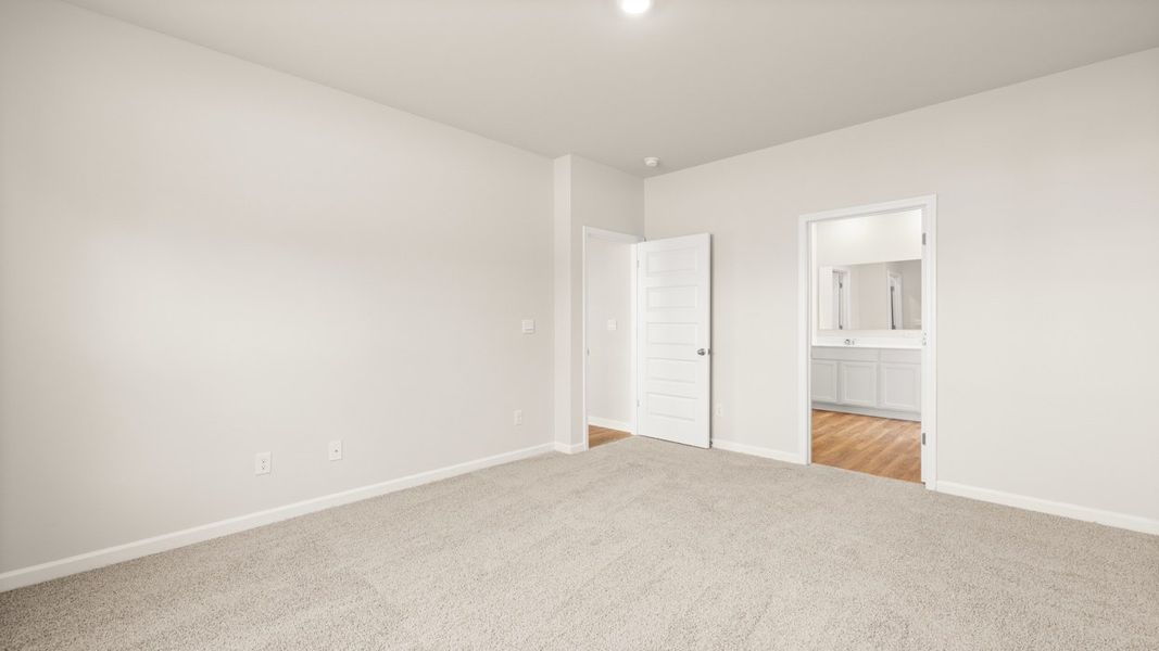 Representative unfurnished interior of a home built from the Elle by D.R. Horton in Preserve at Dove Creek, Statham (Image 19).