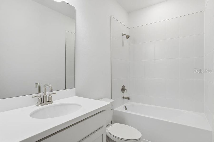 Furnished interior view inside a new home in Center Lake Ranch Community Group Page, St. Cloud (Image 9).