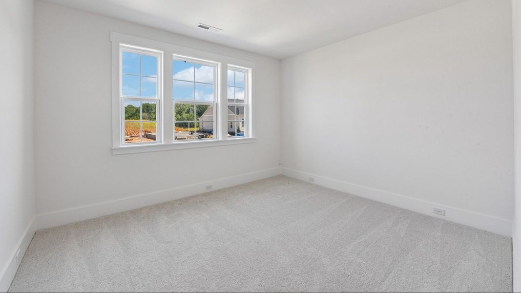 The Awaken Plan by DRB Elevate in Brook Run, Fort Mill SC - Bedroom 2 with walk-in closet