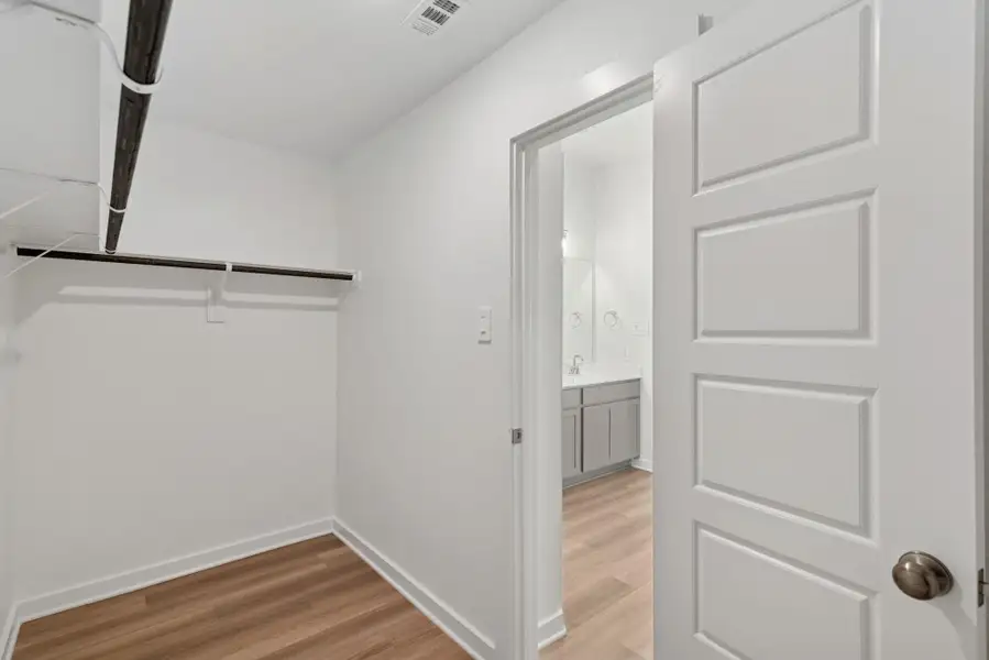 Spacious, unfurnished interior of a new home in Pinewood at Grand Texas, New Caney (Image 11).