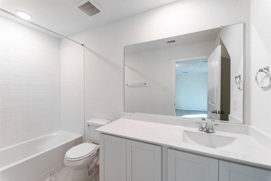 Furnished interior view inside a new home in Cielo, Conroe (Image 12).