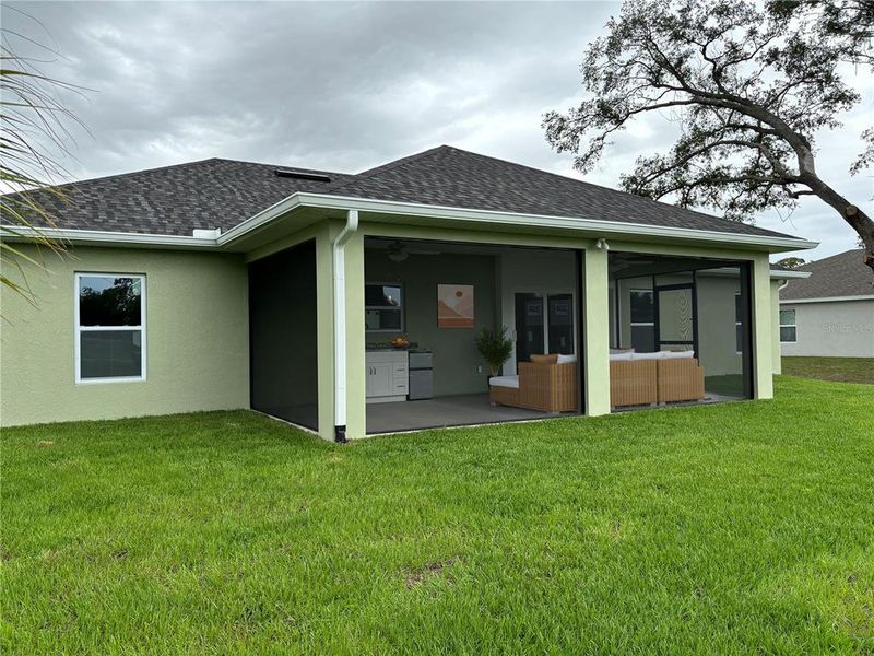 Exterior details and patio area of a home in , Port Charlotte (Image 24).