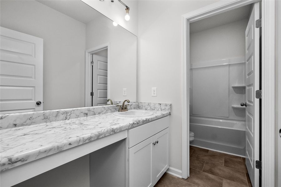 The Coleman- Hall Bath. Home under construction, photo used for illustrative purposes only, colors and options will vary. The Coleman- Hall Bath. Home under construction, photo used for illustrative purposes only, colors and options will vary.