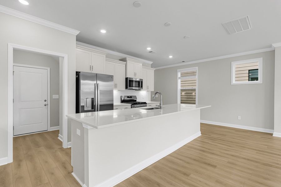Furnished interior view inside a new home in Pineland Preserve, Summerville (Image 7).