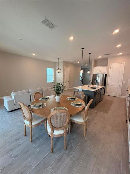 Furnished interior view inside a new home in , Winter Garden (Image 7).