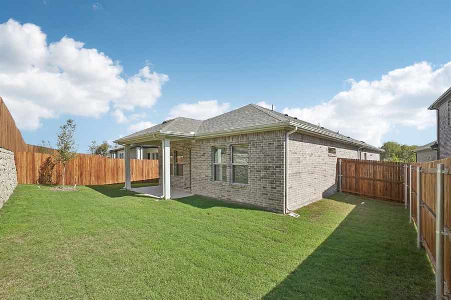 Exterior details and patio area of a home in Eastridge - Spring Series, McKinney (Image 23). Exterior details and patio area of a home in Eastridge - Spring Series, McKinney (Image 23).